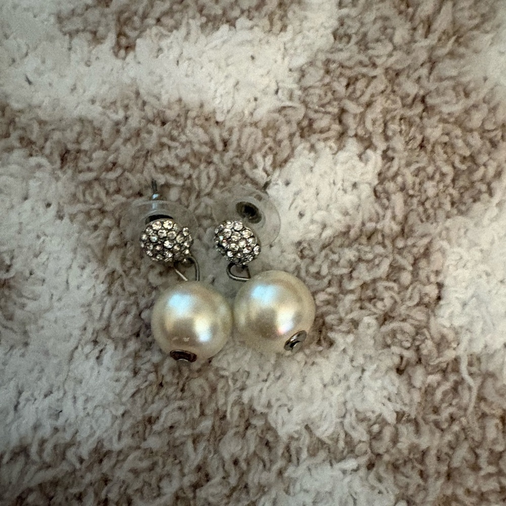 Pearl earrings.
